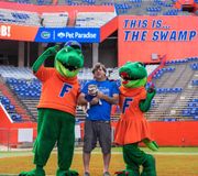 Ronald won PetParadiseResort 's Pet Fanatics giveaway & brought his perfectly named 🐶 "QB" to #TheSwamp to play with Albert and Alberta after being pampered at Pet Paradise in Gainesville! Look at his smile! 🧡 #GoGators