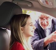 With the help of a booster seat and a cushion, Shauna can see the road for the first time from the driver’s seat! #IAmShaunaRae