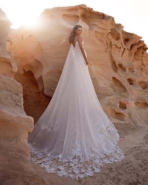 Image post by @dama_couture on Instagram