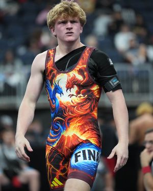 Image post by @adidaswrestling on Instagram