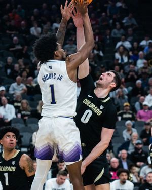 Image post by @uw_mbb on Instagram