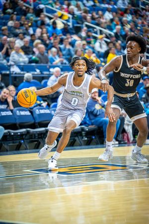 Image post by @UNCGBasketball on Twitter