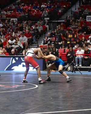 Video post by @NIUWrestling on Facebook