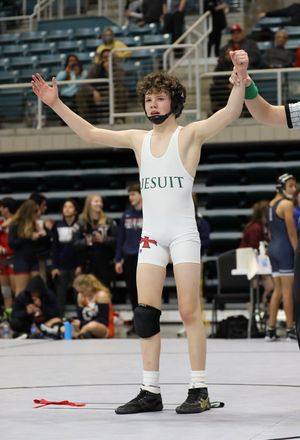 Image post by @WrestlingJesuit on Twitter